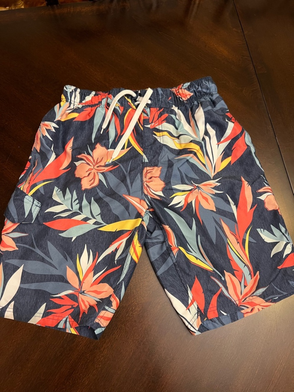 Kanu Surf Navy Floral Swim Trunks with Coral & Yellow Accents